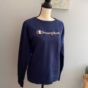 A dark blue champion crew neck